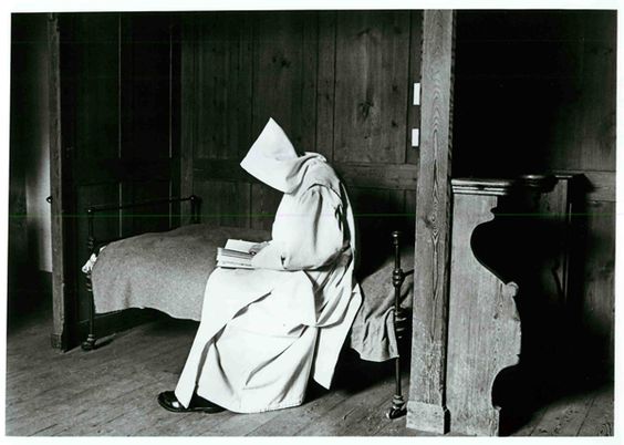 (1985) A Carthusian choir monk sits alone, reading in his cell, at St. Hugh's Charterhouse monastery in Sussex, England. Religion News Service file photo by Colin Horsman